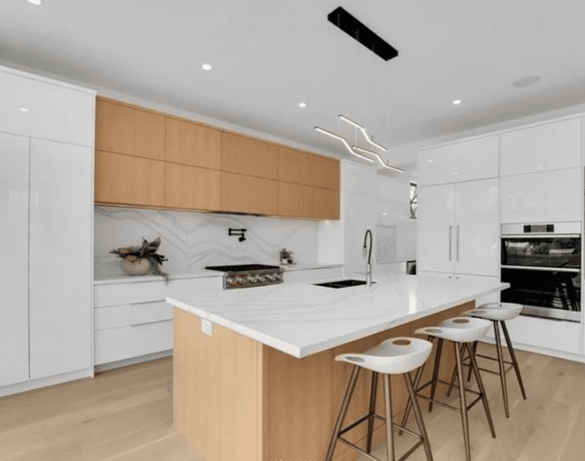 Custom kitchen renovation in Toronto with white cabinetry