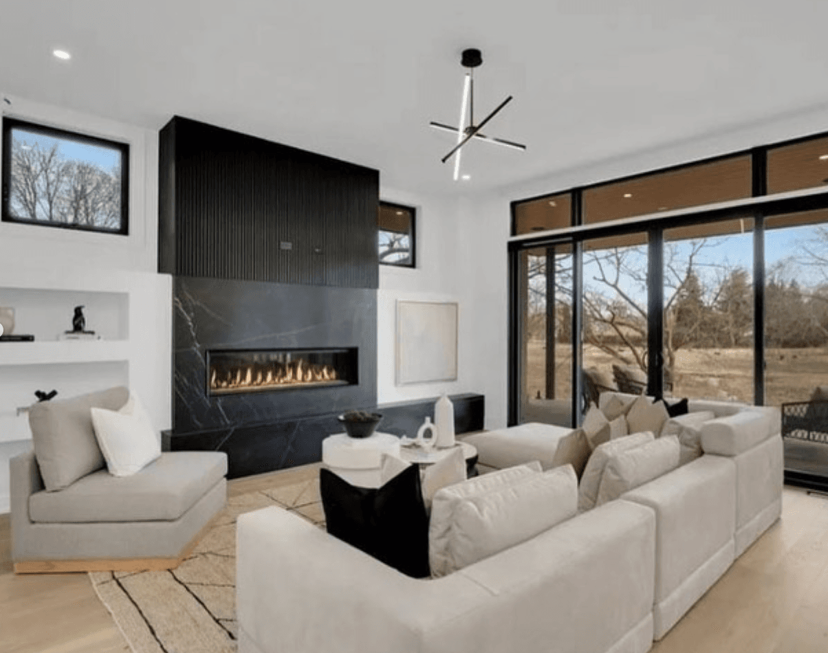 Modern living room renovation with refinished hardwood