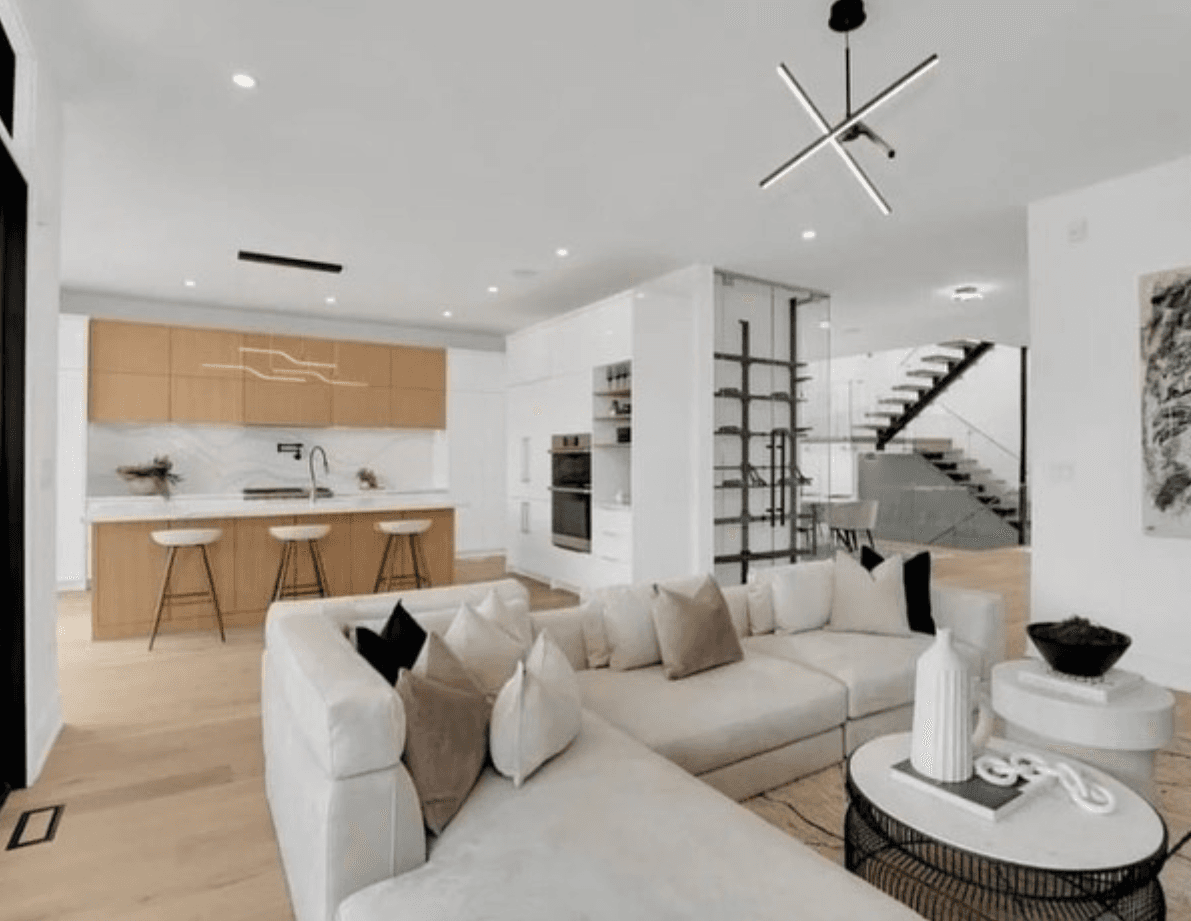 Open-concept living room with custom paint and trim